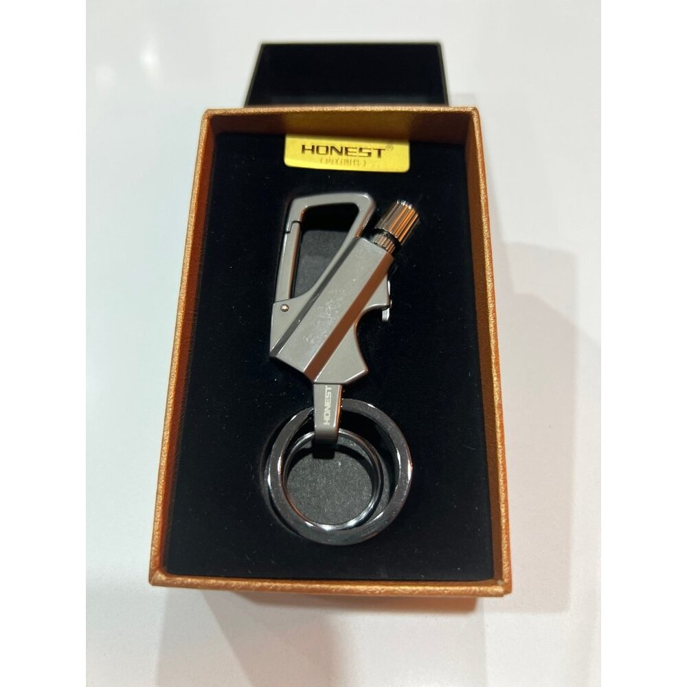 Multitool that serves as a permanent match fire starter and a bottle opener